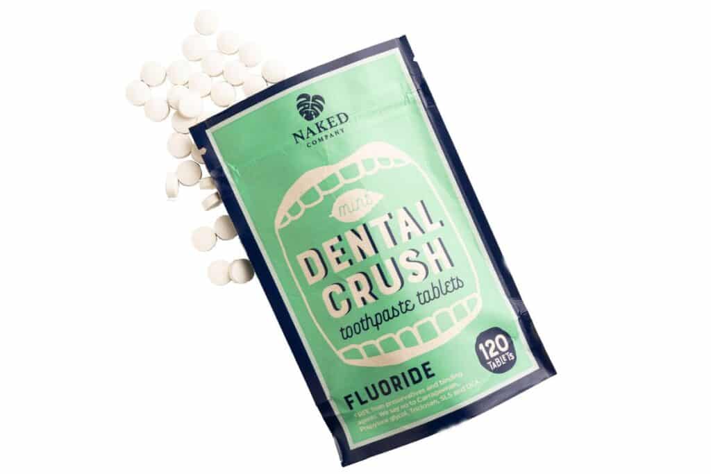 Light green bag of plastic-free toothpaste tablets.