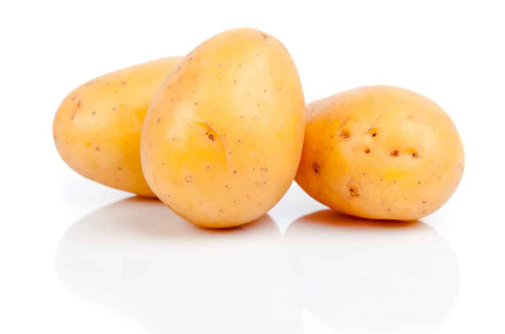 Three yellow potatoes.