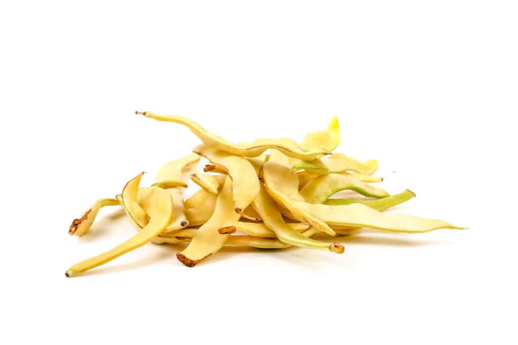 Pile of light yellow snap peas.