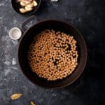 How to cook chickpeas with the garbanzo beans in a pot and aromatics to the side.