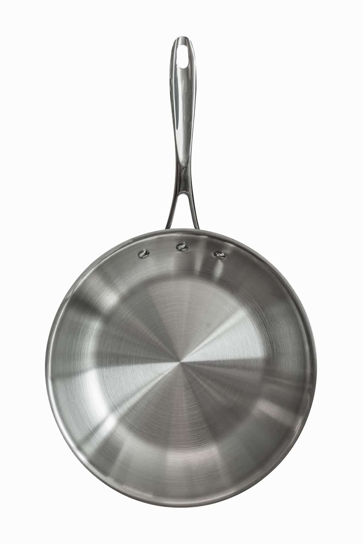 Overhead view of stainless steel frying pan. 