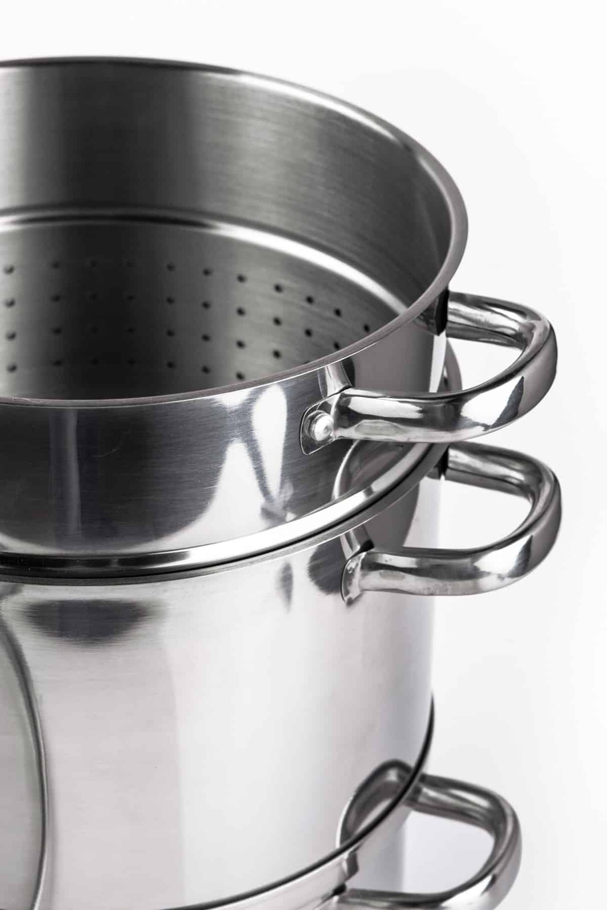 Stainless steel steamer pot stacked.