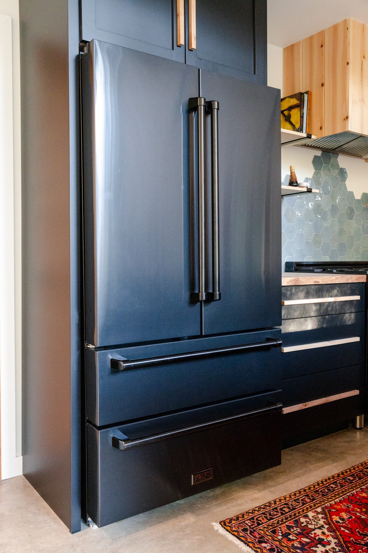 Counter-depth black stainless steel refrigerator from ZLINE appliances.