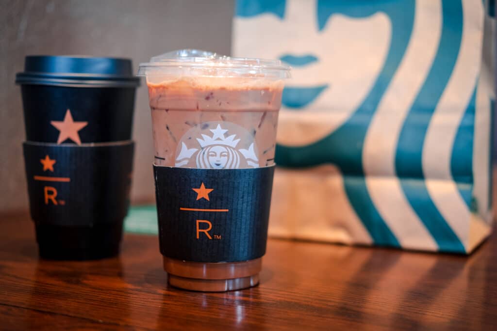 Cold and hot coffee with Starbucks Reserve logo.