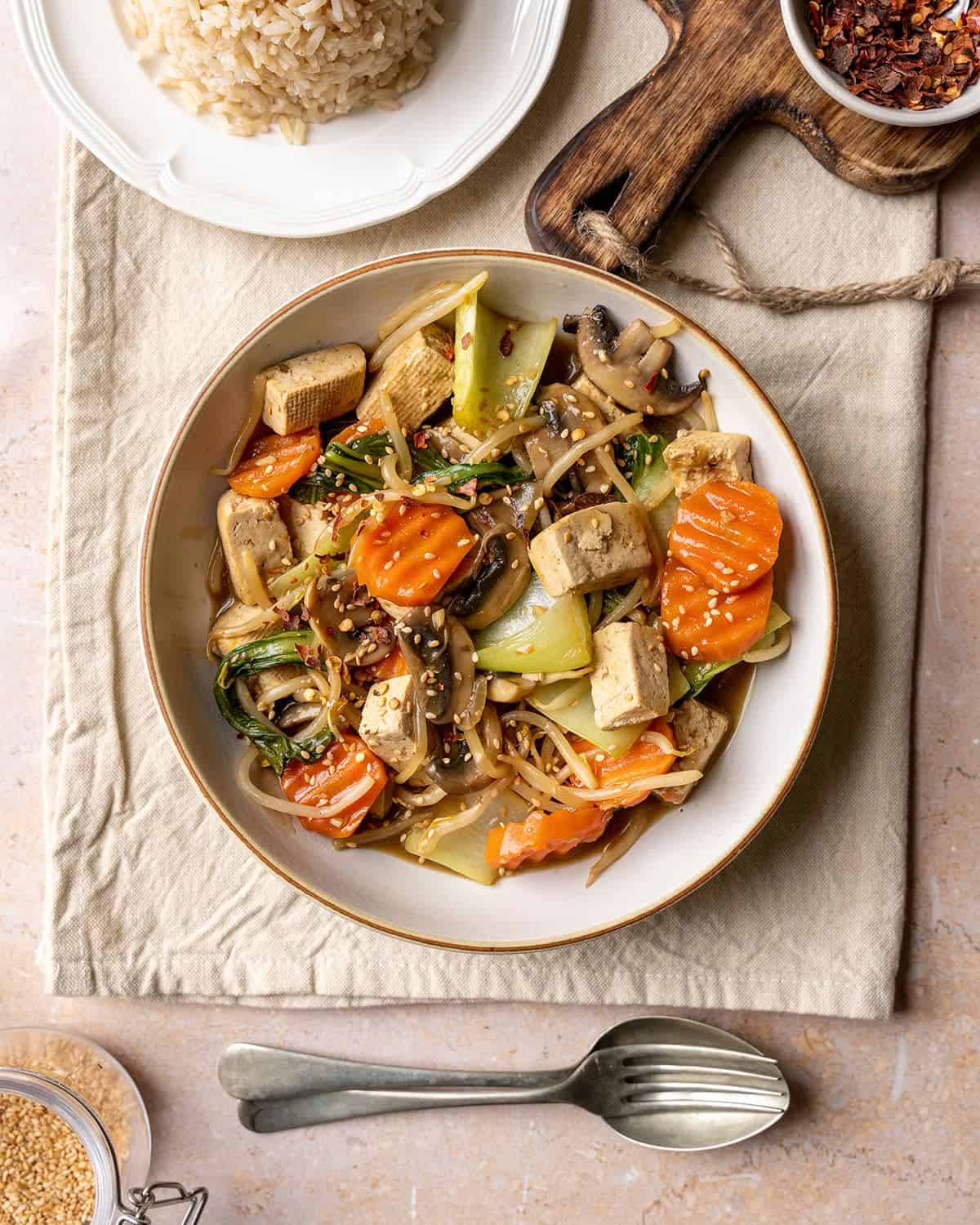 Vegan tofu stir fry with vegetables and rice.