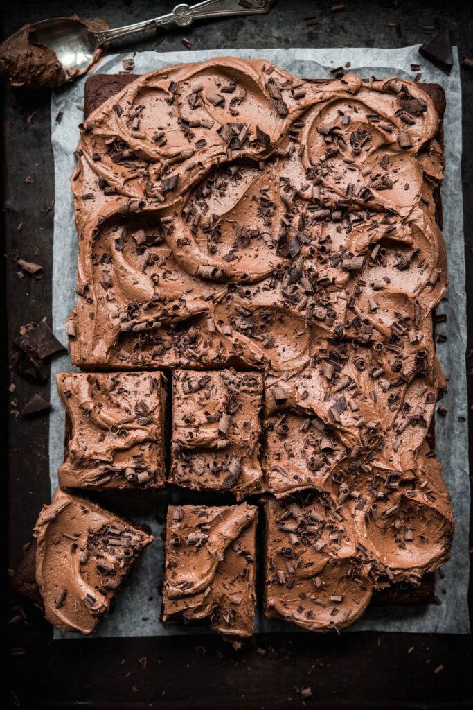 Chocolate sheet cake with swirling chocolate vegan buttercream frosting. 