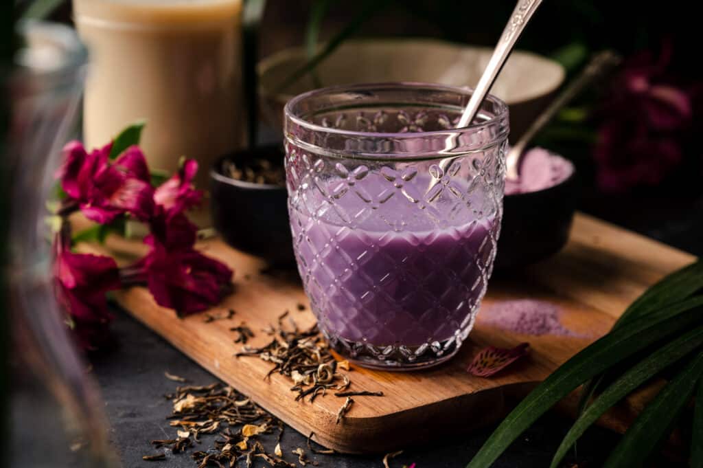 Freeze dried purple taro stirred into the jasmine tea.