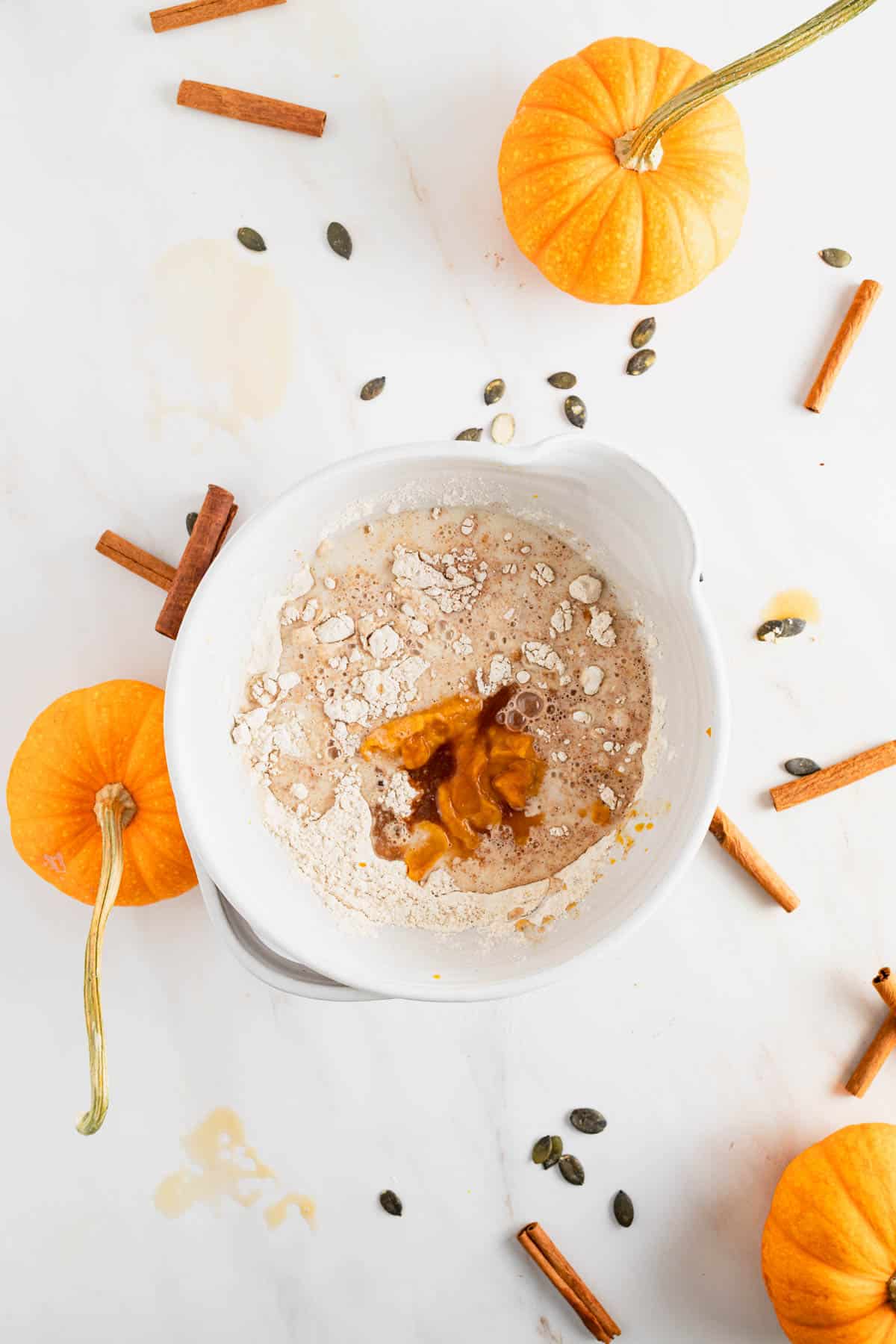Wet ingredients added on top of dry ingredients and stirred together.
