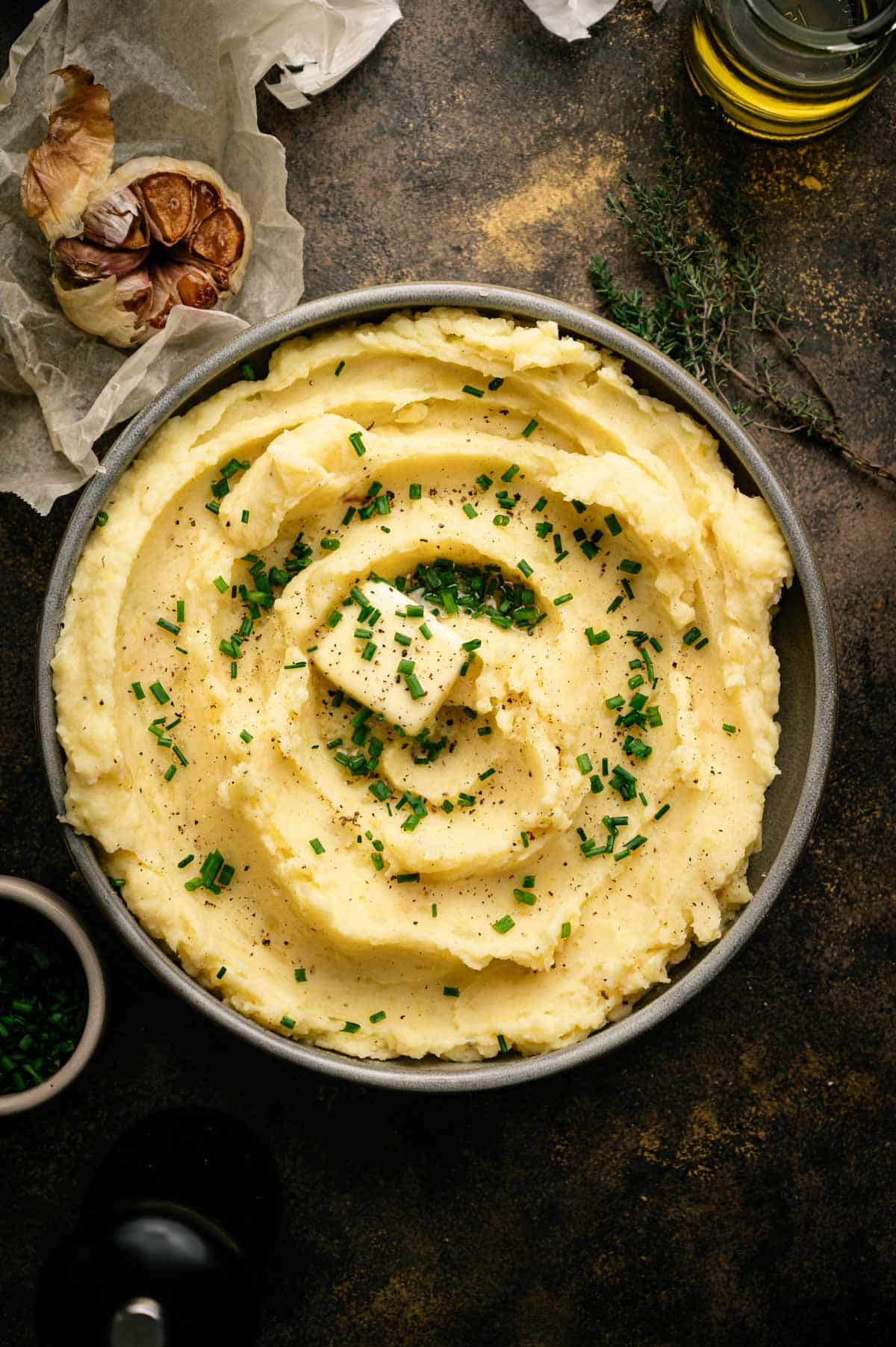 Chopped chives added on top of the plant-based mashed potatoes.