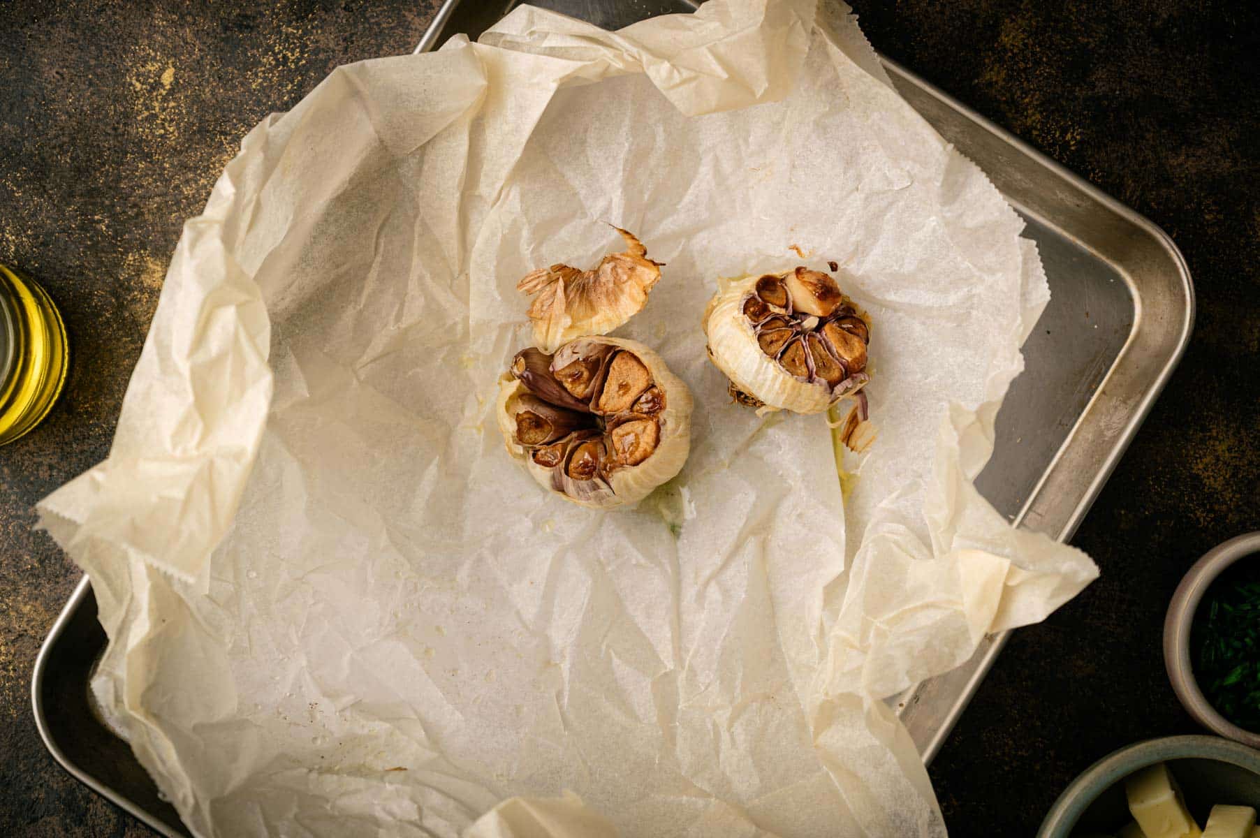 Roasted garlic in parchment paper.