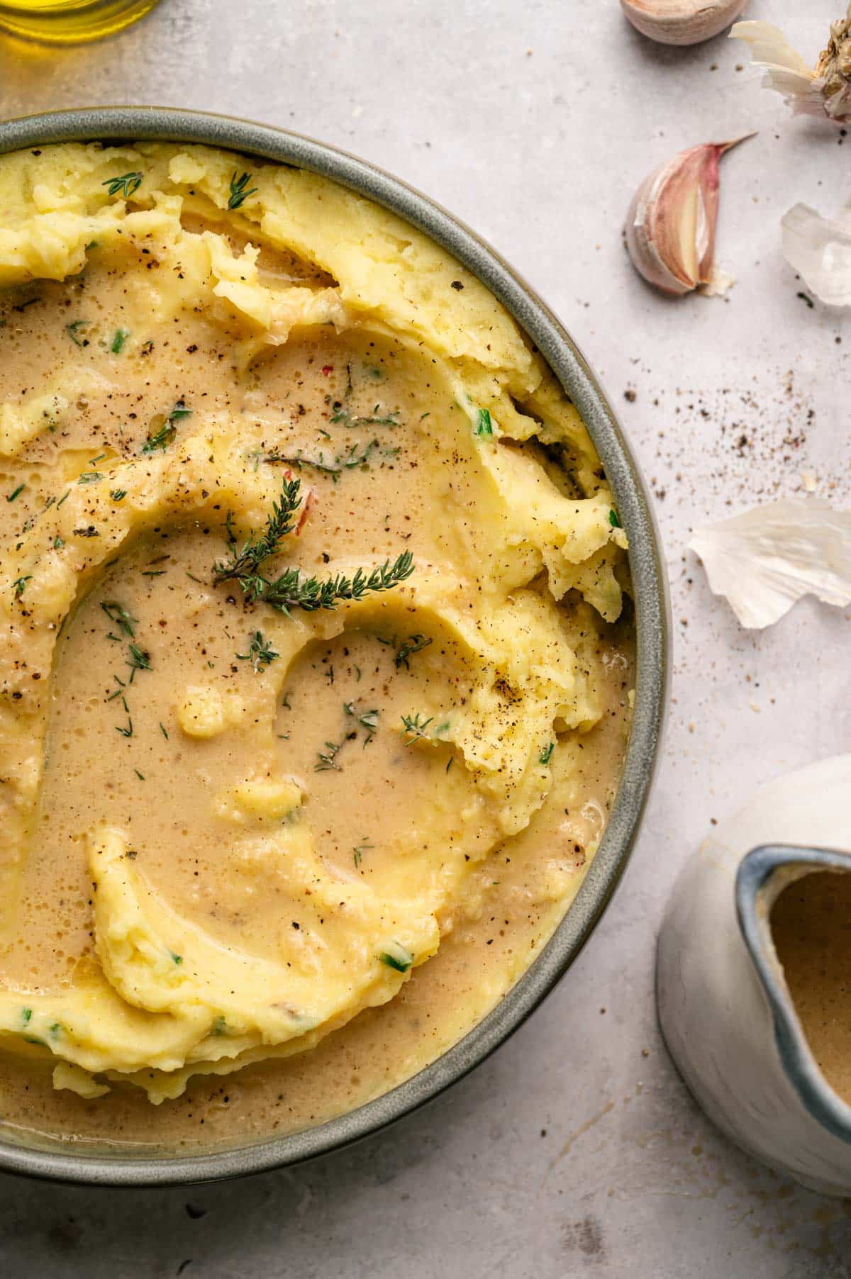 Close up of mashed potatoes smothered in vegan gravy.