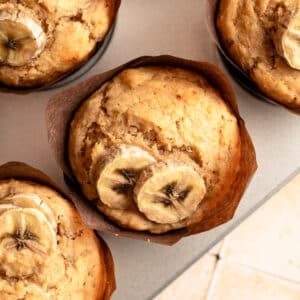 Close up of banana protein muffins in the baking tin.
