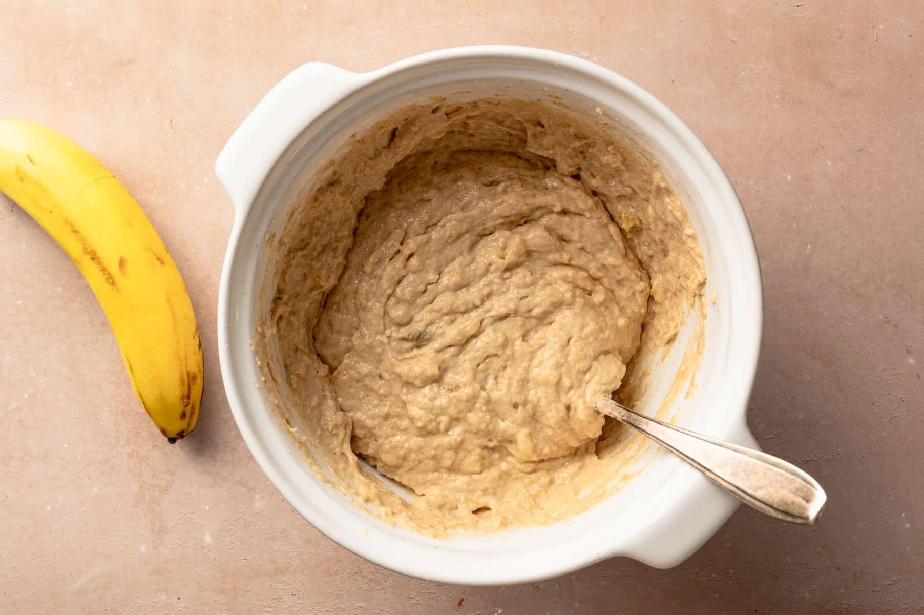 Batter for homemade banana muffins with protein.