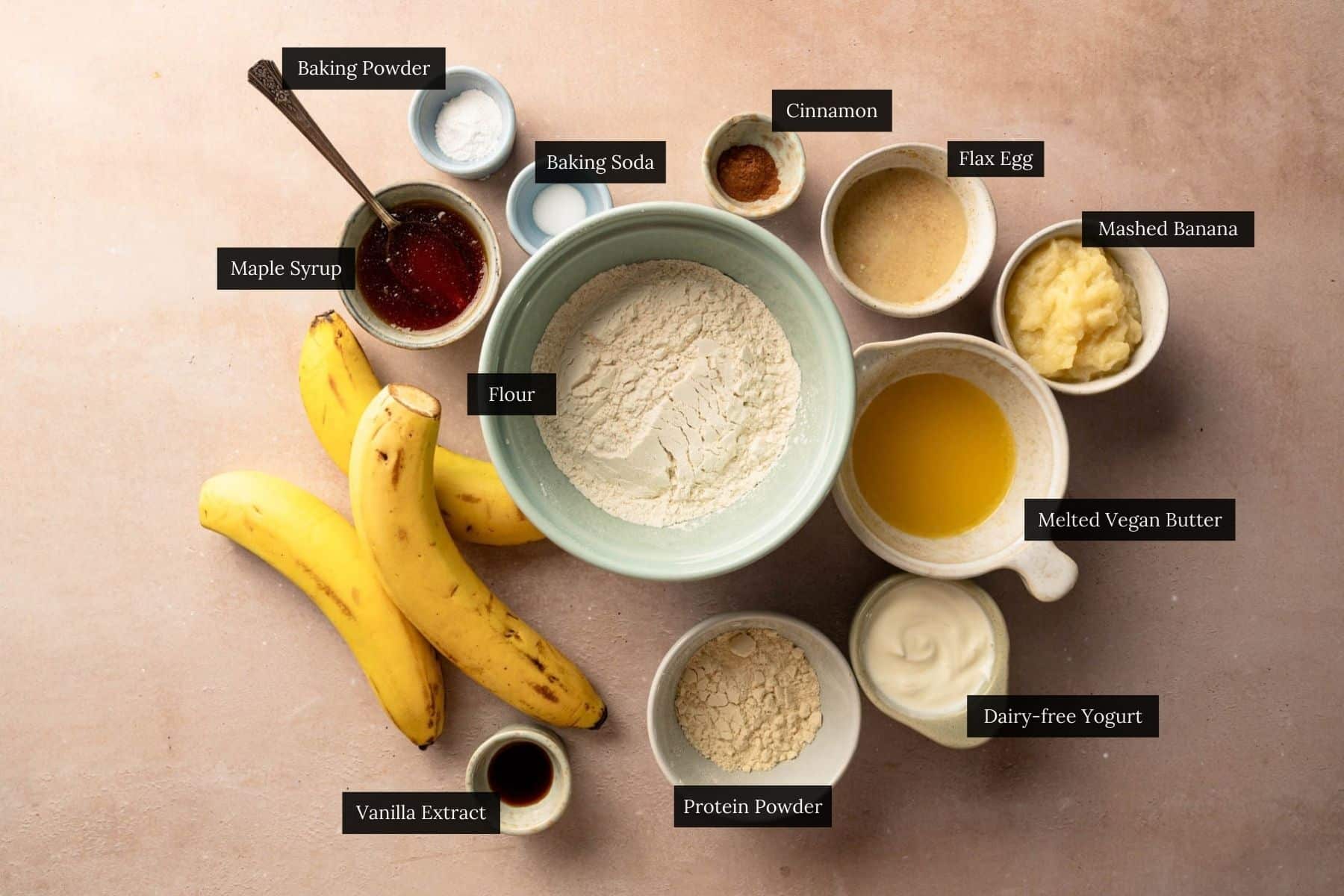 Ingredients for protein muffins with banana in bowls.