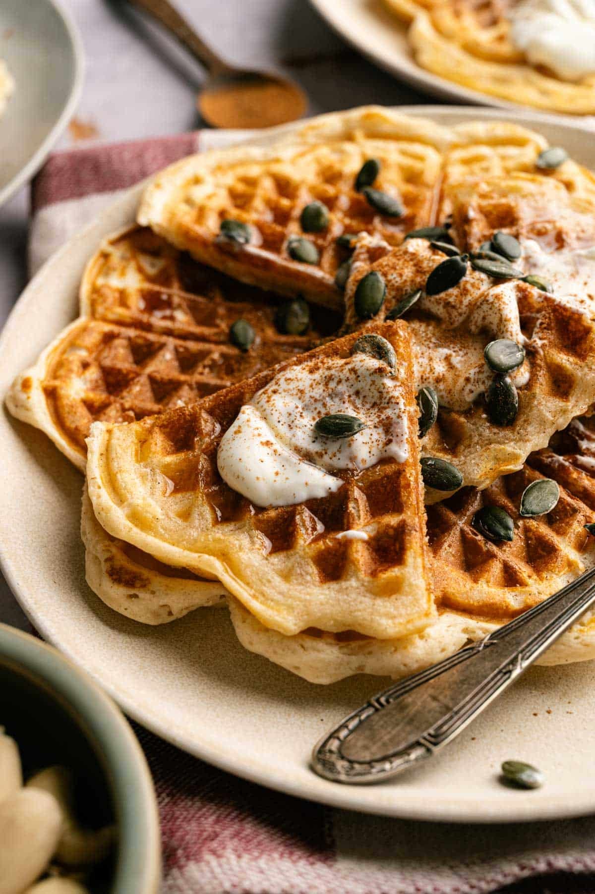 Close up of flower shaped protein waffles.